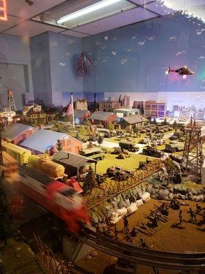 Model train set with helicopter.