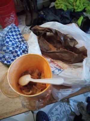 Soaking wet churros with menudo juice all over it.