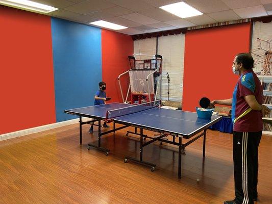 Private ping-pong lesson in action.