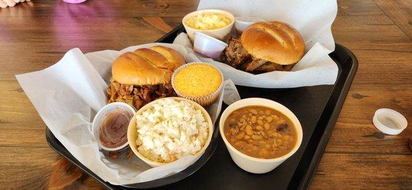 Smoked chicken sandwich, slaw, cornbread muffin(L) beans, brisket sandwich, mac'n'cheese(R)