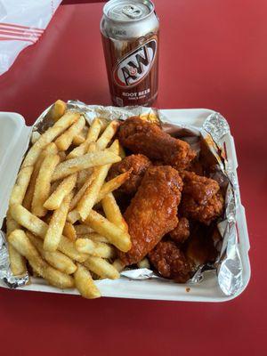 Lunch special Buffalo wings and fries, w canned soda