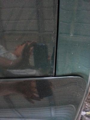 This is the decklid the right rear 1/4 panel and the spoiler going across the bottom. No color mismatch there :O