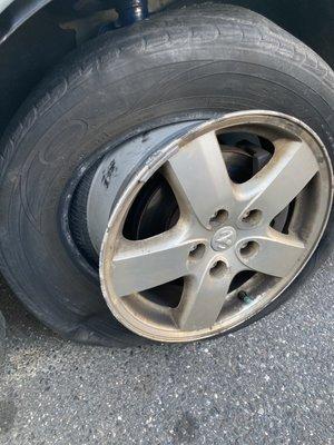 Flat tire & tire is completely off rim & they fixed this headache in less than 15 mins!!