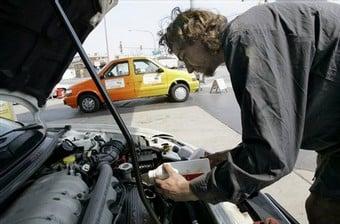 Our automotive technicians know how to work on your car! The famous Automobius is in the backround.