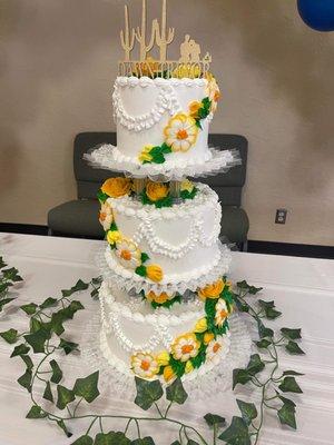 Our wedding cake. Three layers of white cake, each layer filled with a different fruit filling: lemon, strawberry, and blueberry