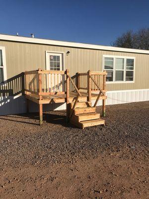 This Deck here is 8x10 with steps and railing $1,395