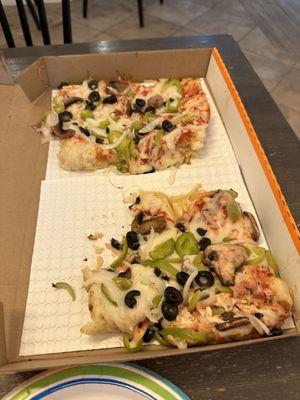 Poor sad veggie pizza. Cold with no sauce.