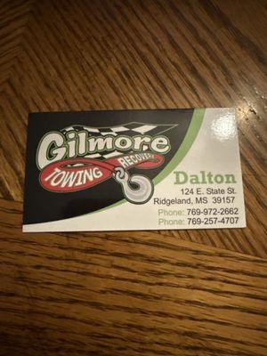 His business card . Of his Towing service