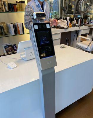 fully automated temp checker greets you!