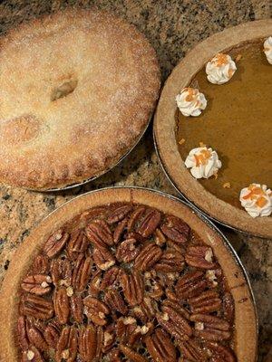 Pumpkin pie, pecan pie, and apple pie