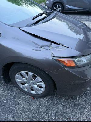 Damage showing the Arkanoff vehicle backed into my mom's car.