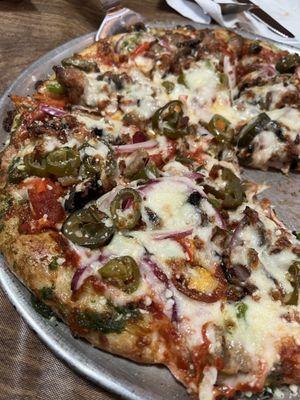 Deluxe Pizza w/ added Jalapeños, Bacon & Extra Cheese