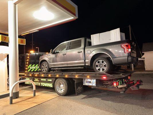 My truck being towed, making a pit-stop