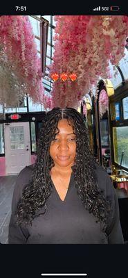 Flawless wig install with long, loose curls and a clean side part - styled for elegance at Supreme Hair Salon in the DMV