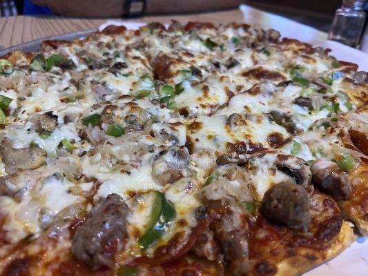 Deluxe Pizza with sauerkraut added $26.50