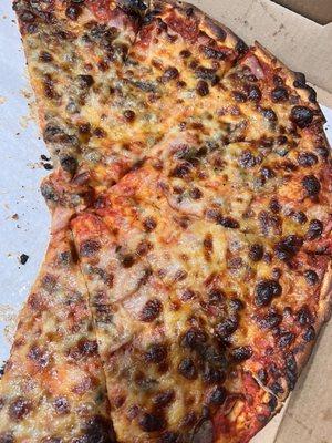 This is the Canadian bacon and mushroom pizza, well it's supposed to be.