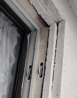 Here is an example of what they said was pressurewashed, scraped, primed, caulked and painted.