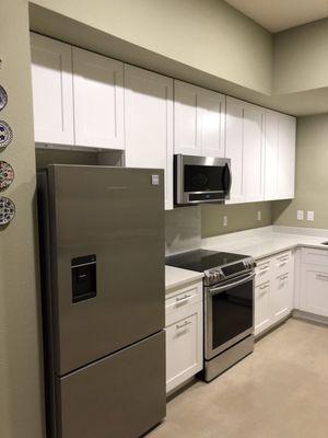 Upper cabinets sold and installed by Pedma Stone.