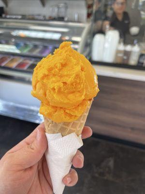 Orange ice cream in a waffle cone! Their ice cream is soo delicious I am so excited to come back!!