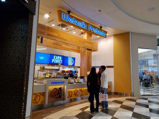 Inside Westfield Valley Fair, next to Starbucks