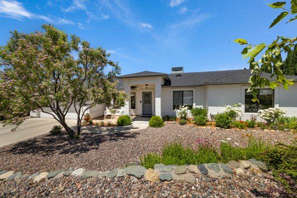 The highlight of the home at 3310 Aster Drive? The stunning front yard!