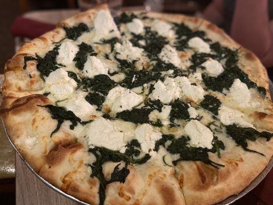 White pizza with ricotta spinach and broccoli
