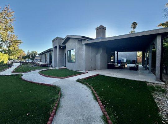 Spacious outdoor patio and landscaped walkways at Rite Care Homes, offering seniors fresh air, comfort, and a peaceful place to relax