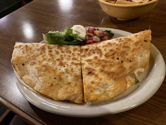 Quesadilla. Lots of cheese, bacon and beef on the inside. The waitress was helpful and friendly too.