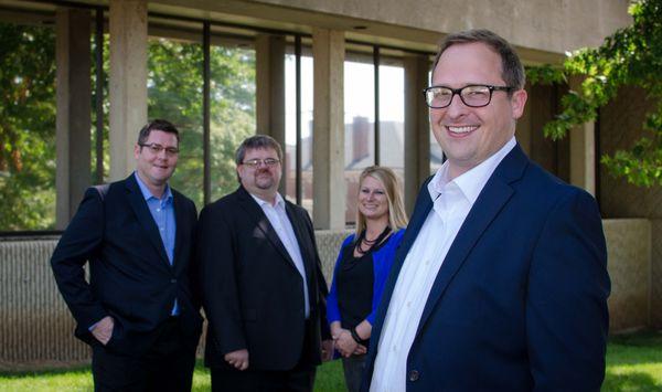 Getting the team together in front of the office.