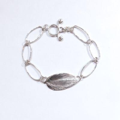 Floating Feather Bracelet.
Hand made in sterling and fine silver.