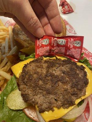Bacon Bacon 'n Cheese Single Steakburger 'n Fries compare the patty to the ketchup packet