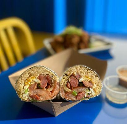 Tocilog Burrito: Filipino sweet pork w/ adobo garlic rice, tomatoes, fried egg ($15.50)