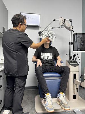 Dr Lu assessing eyes