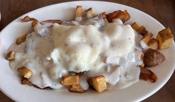Breakfast Horseshoe (with American fries, bacon, sunny-side up eggs, and gravy)