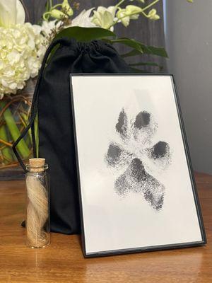 Memorialize your animal companion with paw prints and a lock of fur.
