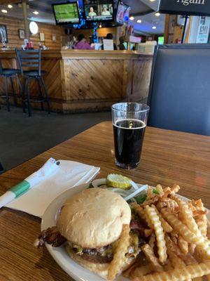 Awesome cheeseburger Tuesday special with fries, and a pint draft of Cookie Exchange Milk Stout.