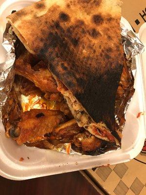 Burnt pizza and dry wings with no flavor. Some pieces had so many feathers left on it I couldn't stand to eat another bite.
