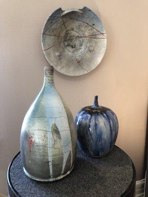 Left and Center, 2 Raku pieces; the jewel-tone blue bottle, wood fired.