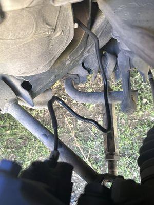 Camber arm out of place still. Brake line leaking lots of fluid. One hour of service to have my car come out worse than how I took it.