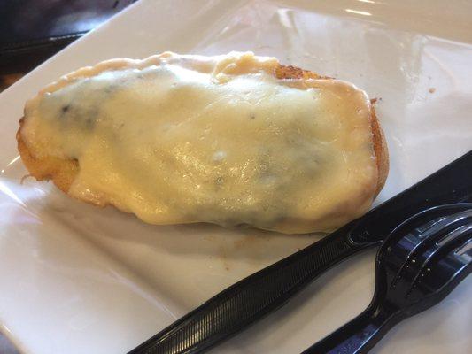 Mollete. It's cheese and refried beans on half a bun. Like grandma used to make.