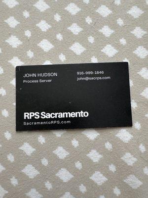 Their business card that was given to me when I first met John Hudson at the parking lot to hand him my legal document.