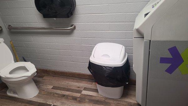 Fairly clean bathroom with ATM machine in there