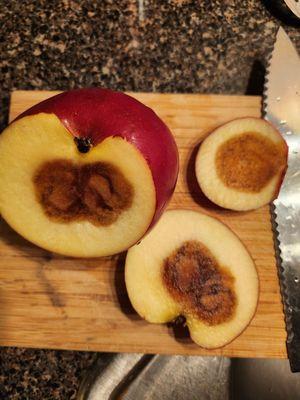Disgusting rotten to the core apples from Garrys farmers market in Mission Hill next to penguin pizza