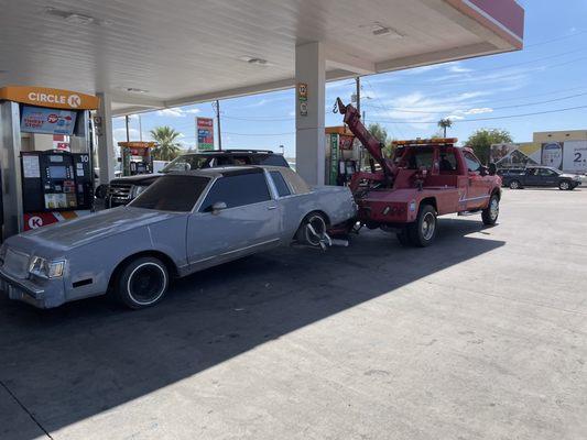 Company tow truck doing our first tow