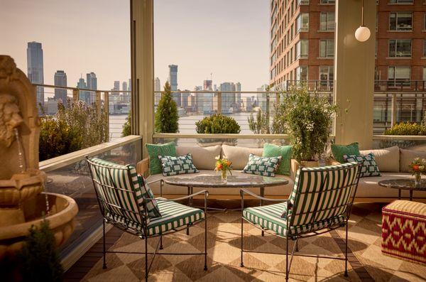 Hudson River views, lounge seating, Amalfi Coast-inspired fountain