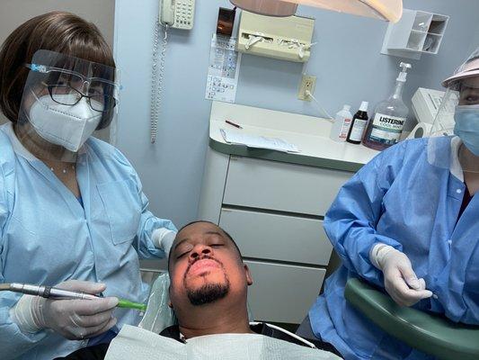 With Dentist Maria Zara & her assistant getting a cleaning