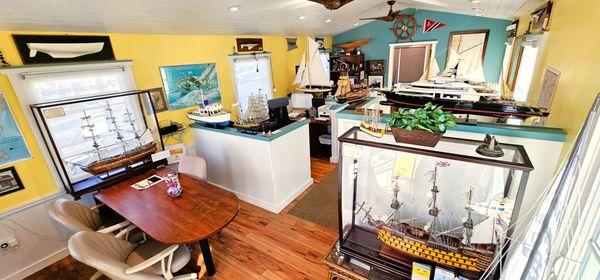 Our office is like a nautical musuem filled with historic ship models and lighthouses.