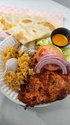 Grilled chicken with salad, rice and beans