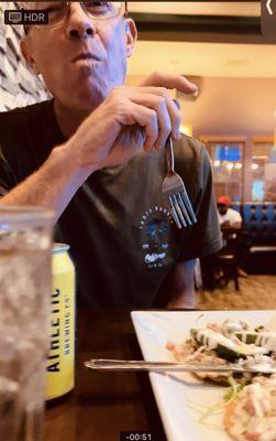 Bf eating the Crab Avocado Tostada