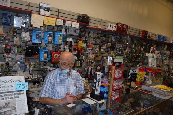 George the Greek at the counter, Radio Shack Ely